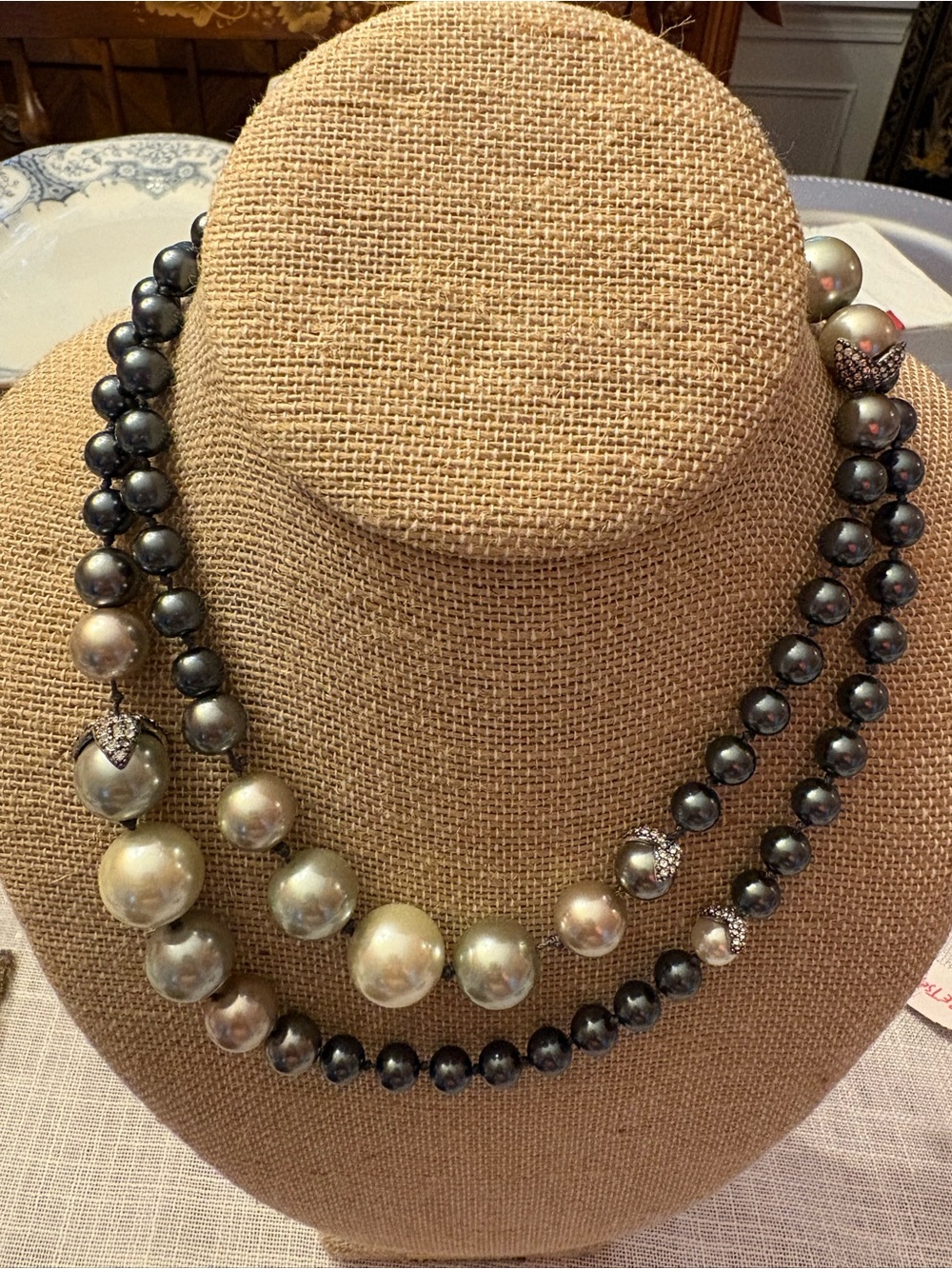 Lulu Frost Two-Strand Black and Cream Pearl Necklace with Rhinestone Accents.